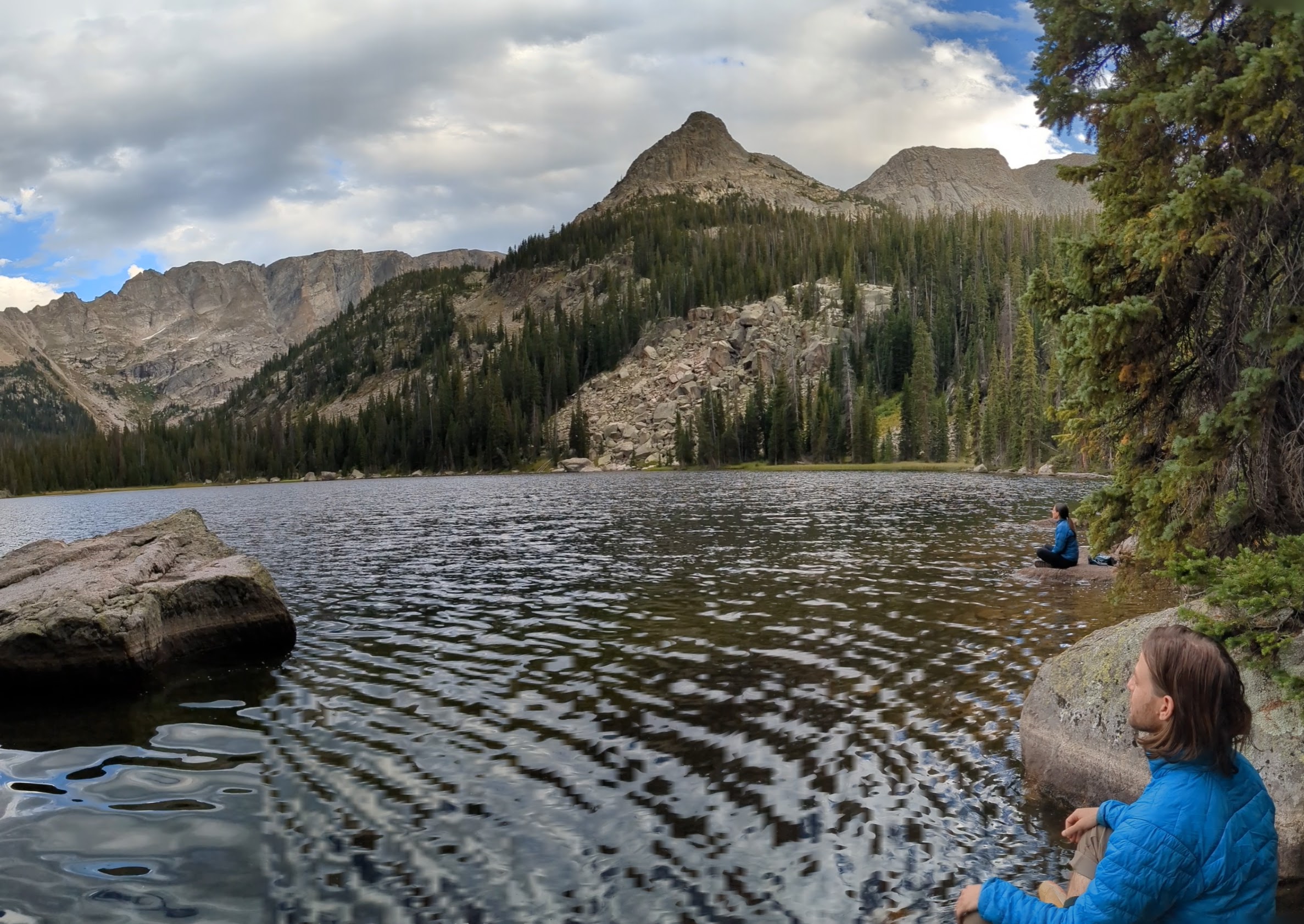 Sitting by the lake reflection